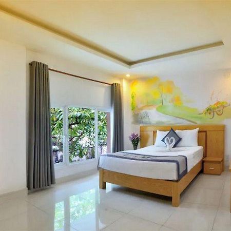U And Me Hotel Tan Phong エクステリア 写真